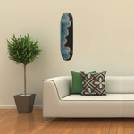 Baynyi Deck from Burruguu Art and Postal Skateboards collective collaboration hanging in a lounge room 